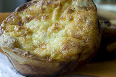 Rustic foods, like this quiche, need rustic dishes and backdrops. [Credit: Focal length: 55mm, Shut