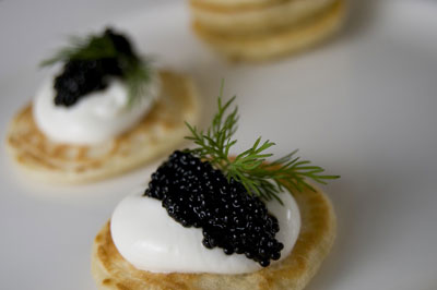 An elegant dish fits perfectly in the prim and proper setting. [Credit: Focal length: 48mm, Shutter