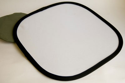 A small, 12-inch white reflector.