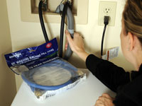 Replacing worn washer hoses prevents leaks.