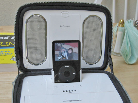 Let the i-Fusion from Sonic Impact provide a dock and speakers for the road.