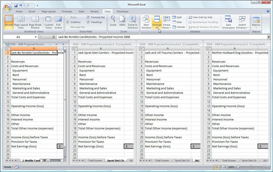 Arrange four worksheet windows with the Vertical option.