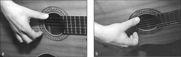 The free stroke. Notice that, after striking a string, the right-hand finger dangles in the air.