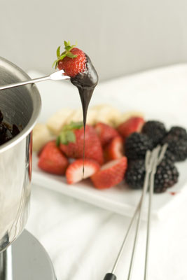 Keep chocolate fondue warm so it doesn’t form a crust. [Credit: Focal length: 85mm, Shutter s