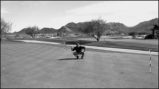 Viewing a putt from the side can help you judge distance and speed.