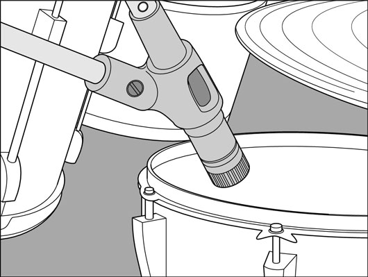 The proper placement for the snare drum mic.