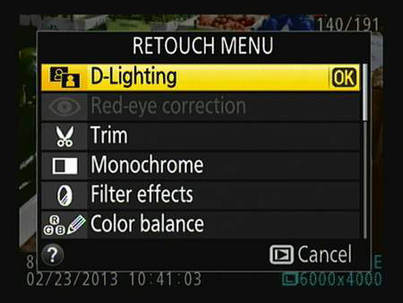 In single-frame playback view, press OK to access the Retouch menu tools.
