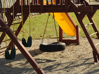 Old tires get a new life in a playground.